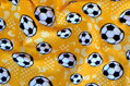 Futbalky na žltom jersey