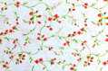 Malé červené kvietky na stonkách - cotton fabric