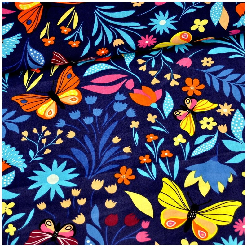 Motýle v kvetoch na tmavomodrom -  cotton fabric 